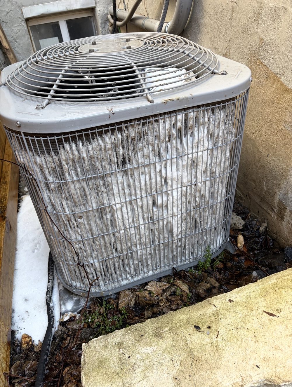 Dirty, clogged AC condenser coil before cleaning