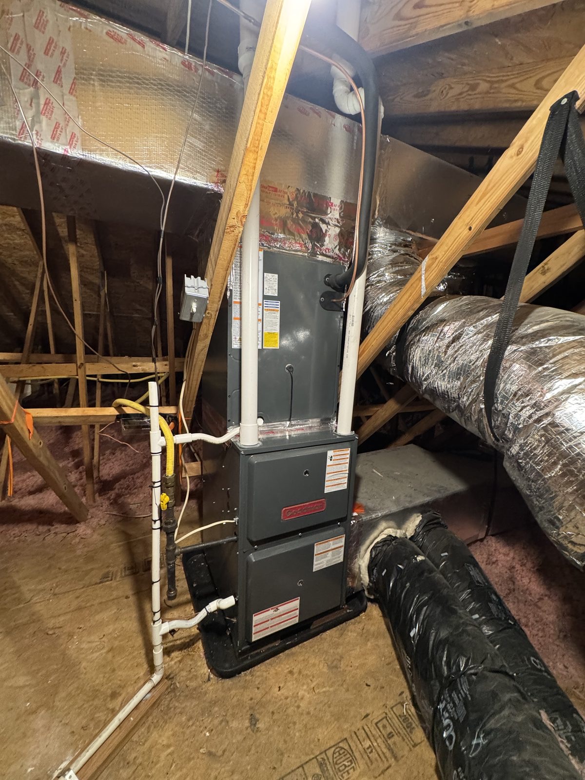 Gas furnace and new ductwork installed in an attic by Lumen Heating and Cooling
