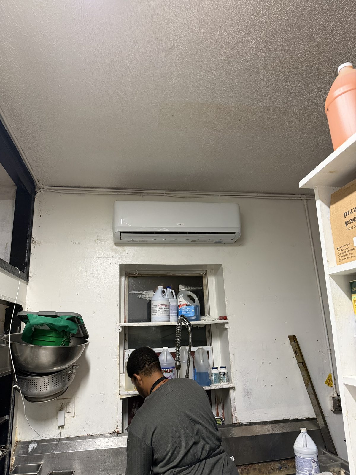 Ductless mini-split wall unit installed in a commercial kitchen by Lumen Heating and Cooling