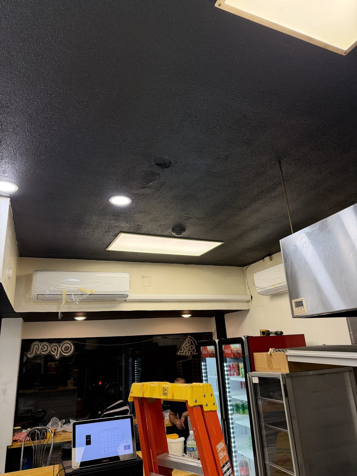 Ductless mini-split indoor unit installed in a retail store by Lumen Heating and Cooling