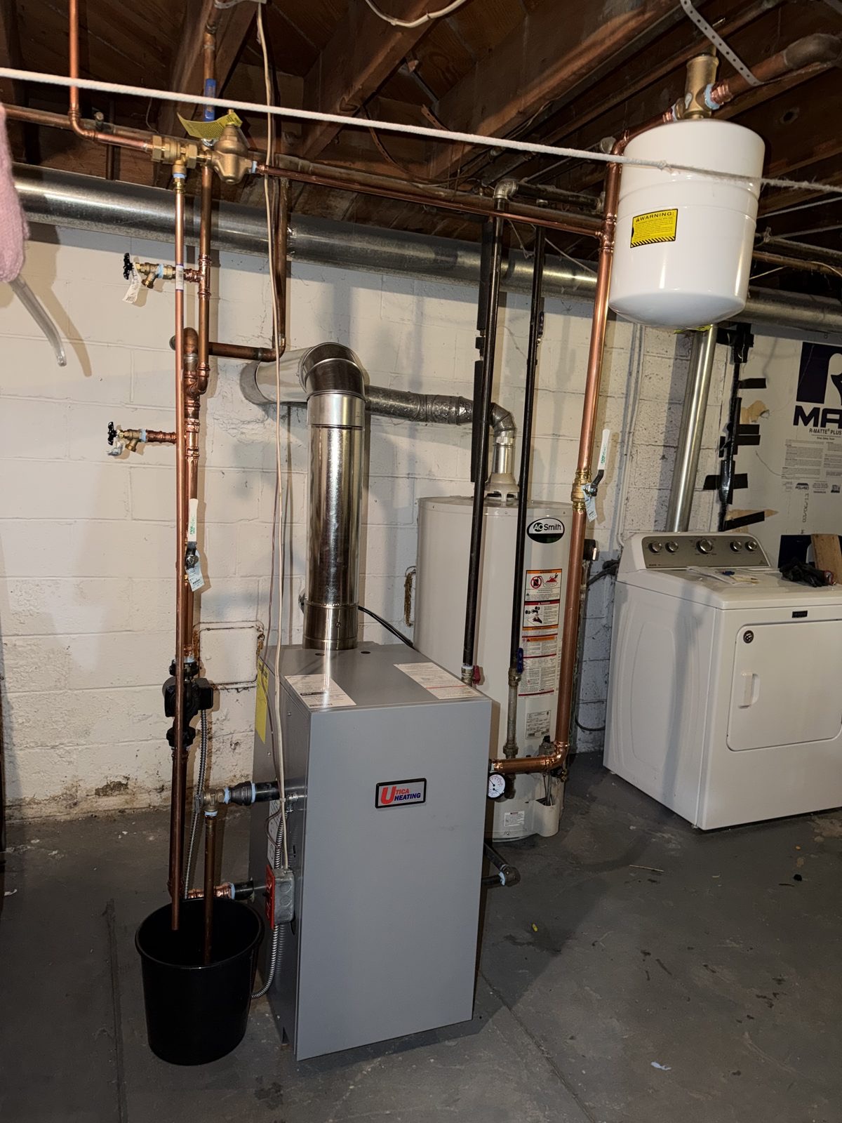 Gas furnace installation with copper piping by Lumen Heating and Cooling in the Philadelphia area